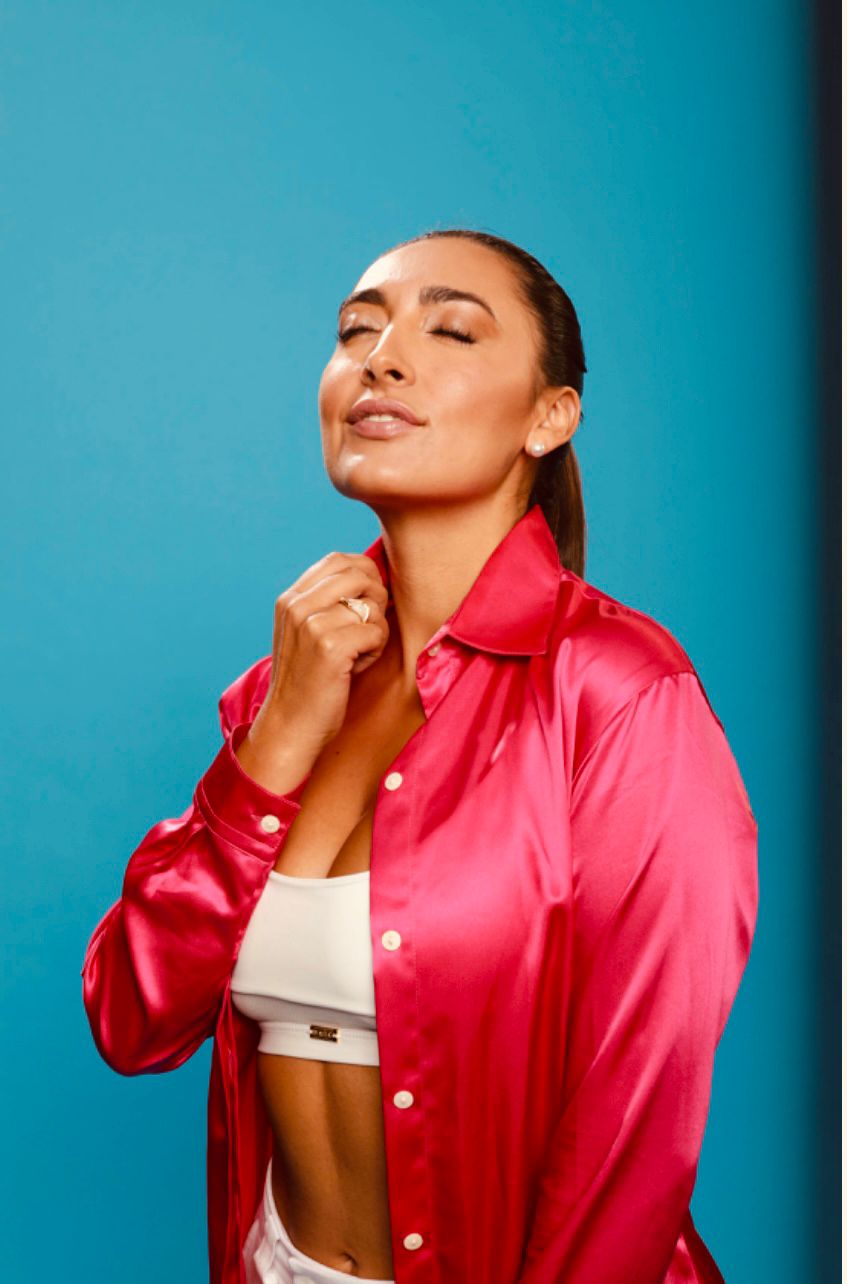 Fuchsia silk shirt — eyes closed, serene